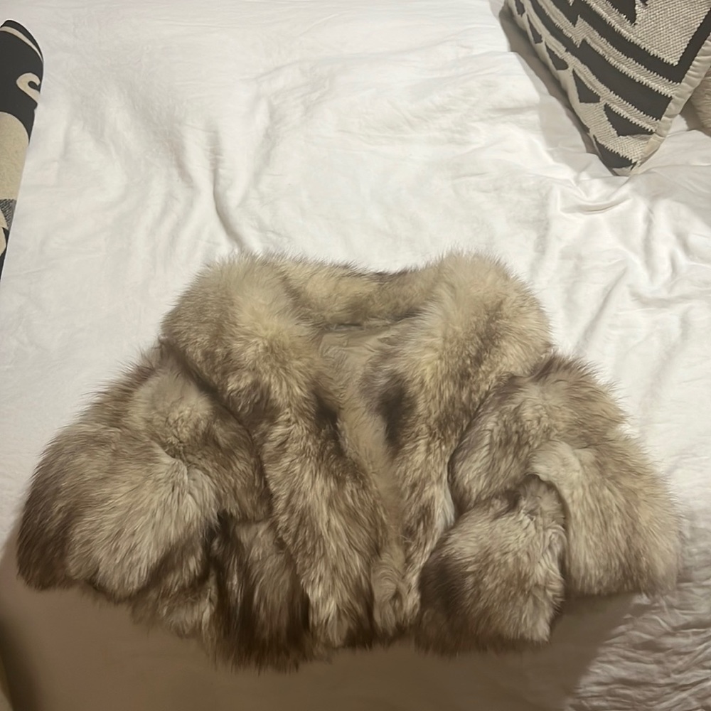 Beautiful cropped fox fur jacket.  Gorgeous on